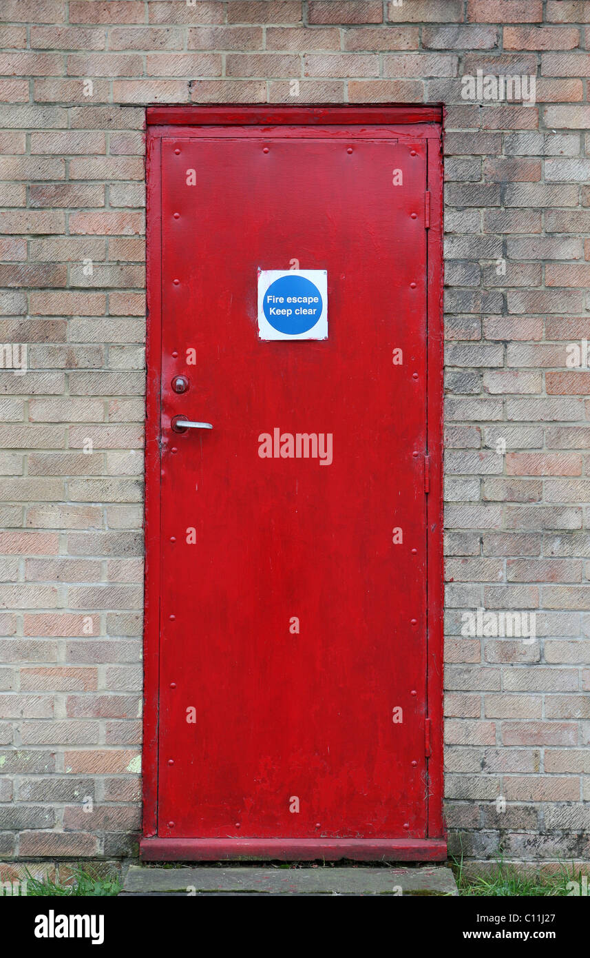Fire escape fire exit red door Stock Photo Alamy