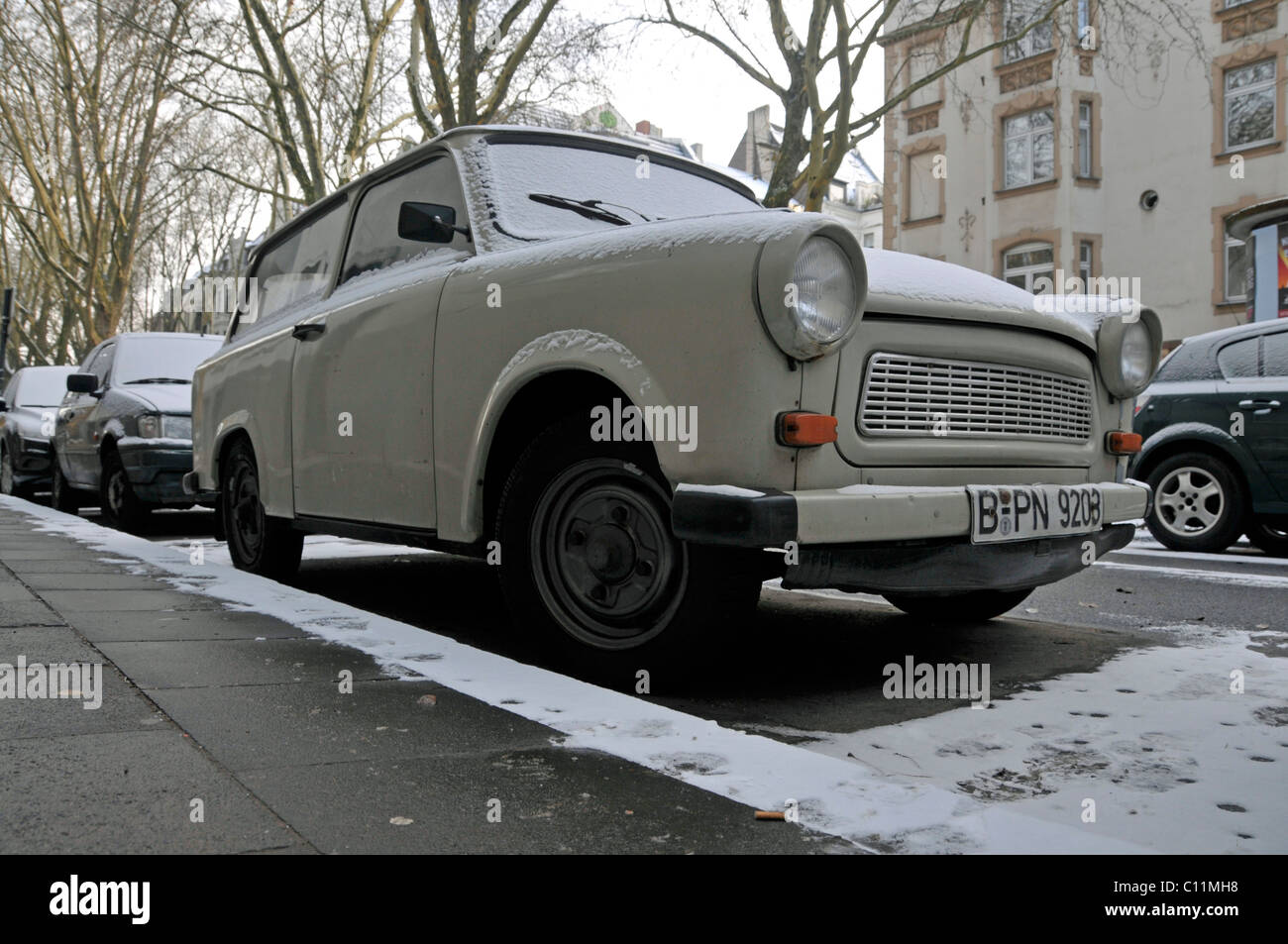 Parked snowy Trabi vintage car, Trabbi, Trabant, Germany, Europe Stock Photo