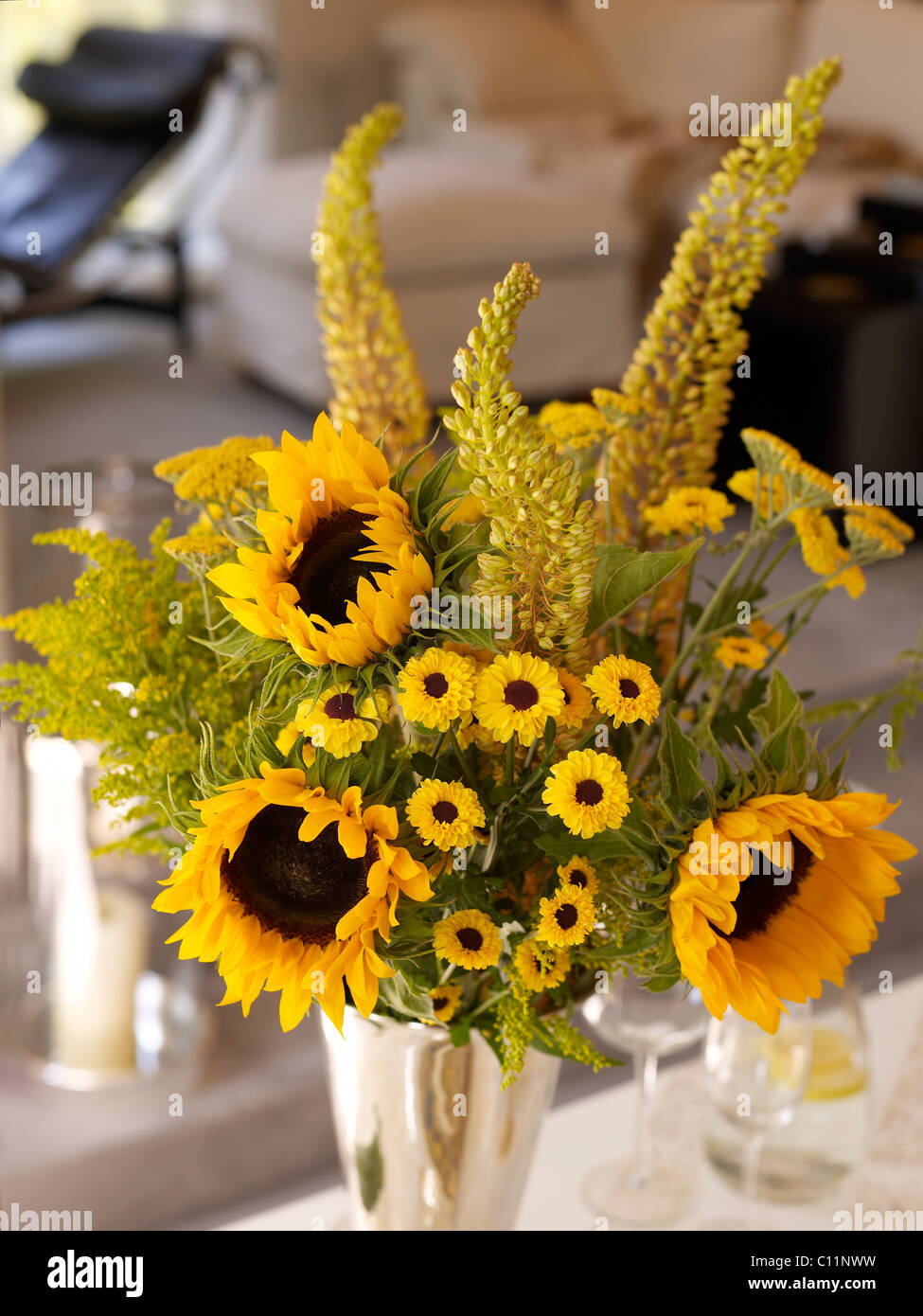 Bouquet of sunflowers in a silver vase Stock Photo - Alamy