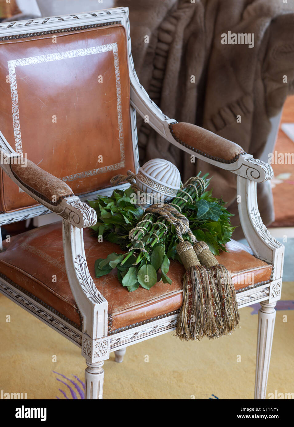 Decorated, antique, leathercovered chair Stock Photo Alamy