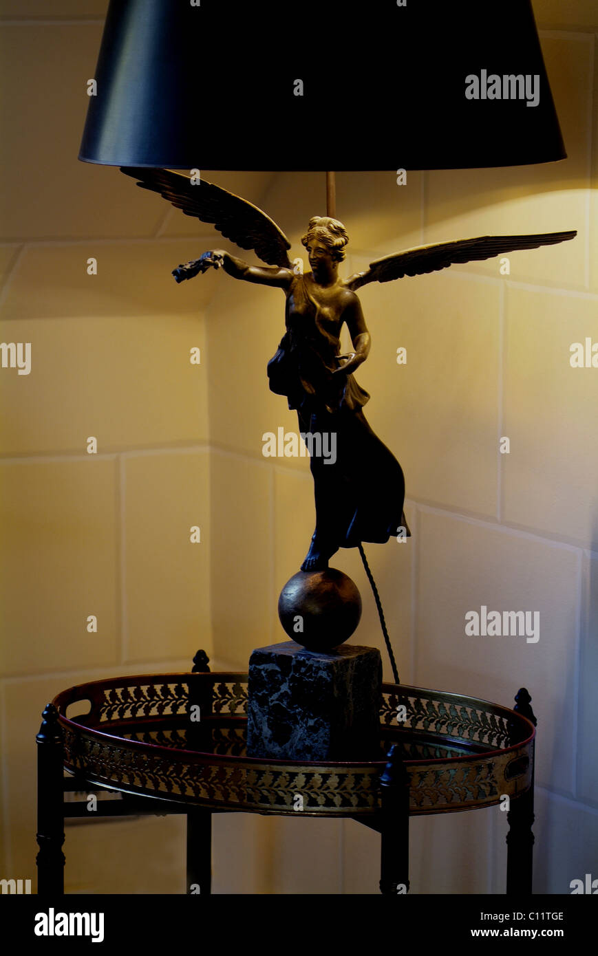 Antique lamp with a bronze angel in the Empire style Stock Photo Alamy