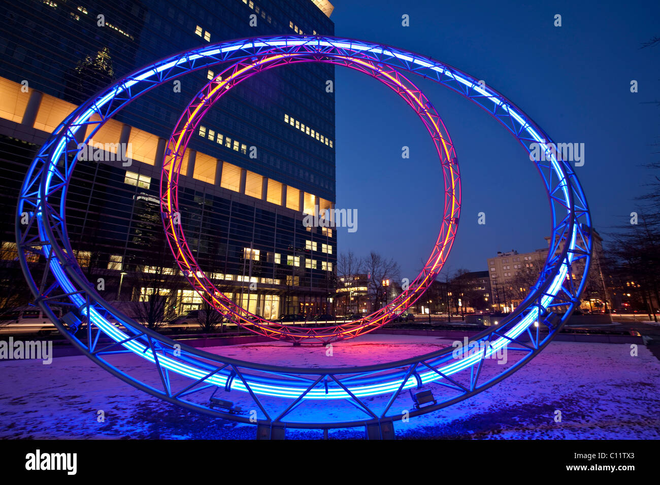 Artwork, illuminated rings between the Commerzbank and the Polluxhaus buildings, Messe Frankfurt Trade Fair Stock Photo