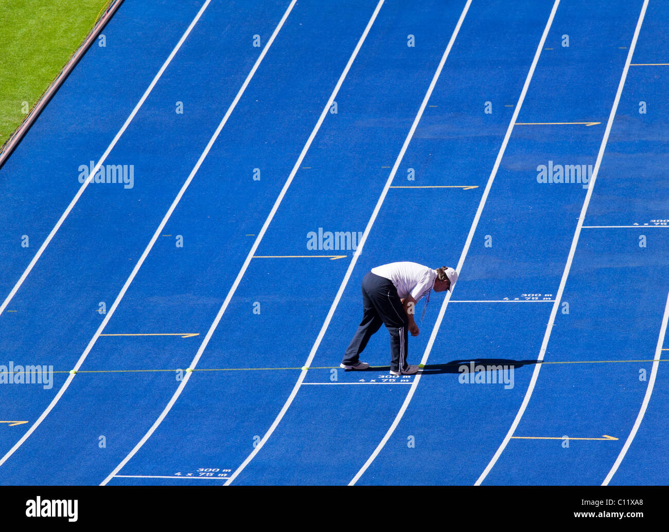 Blue Running Tracks In A Stadium Stock Photo Alamy blue-running-tracks-in-a-stadium-stock-photo-alamy