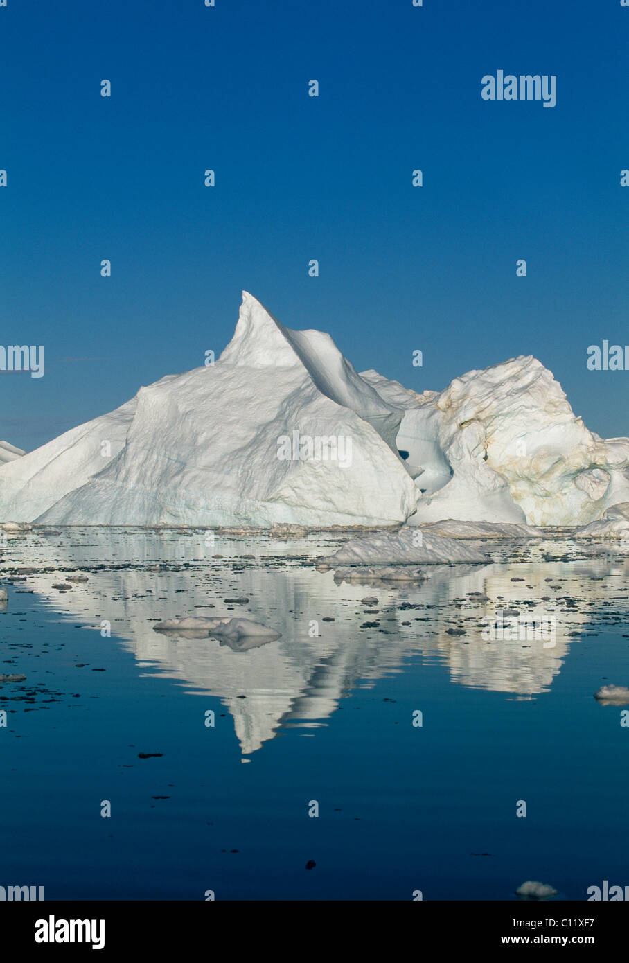 Icebergs with reflection in the Kangia Ice Fjord, Ilulissat, Jabobshavn, Greenland Stock Photo