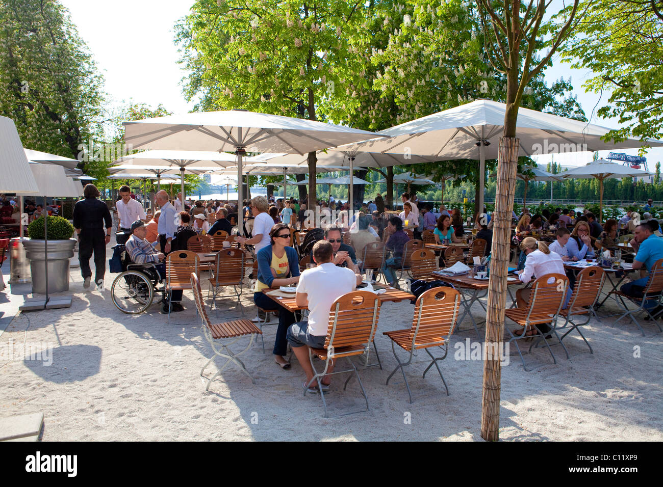 Outdoor restaurant on Main river, cider, Gerbermuehle, Frankfurt, Hesse, Germany, Europe Stock Photo