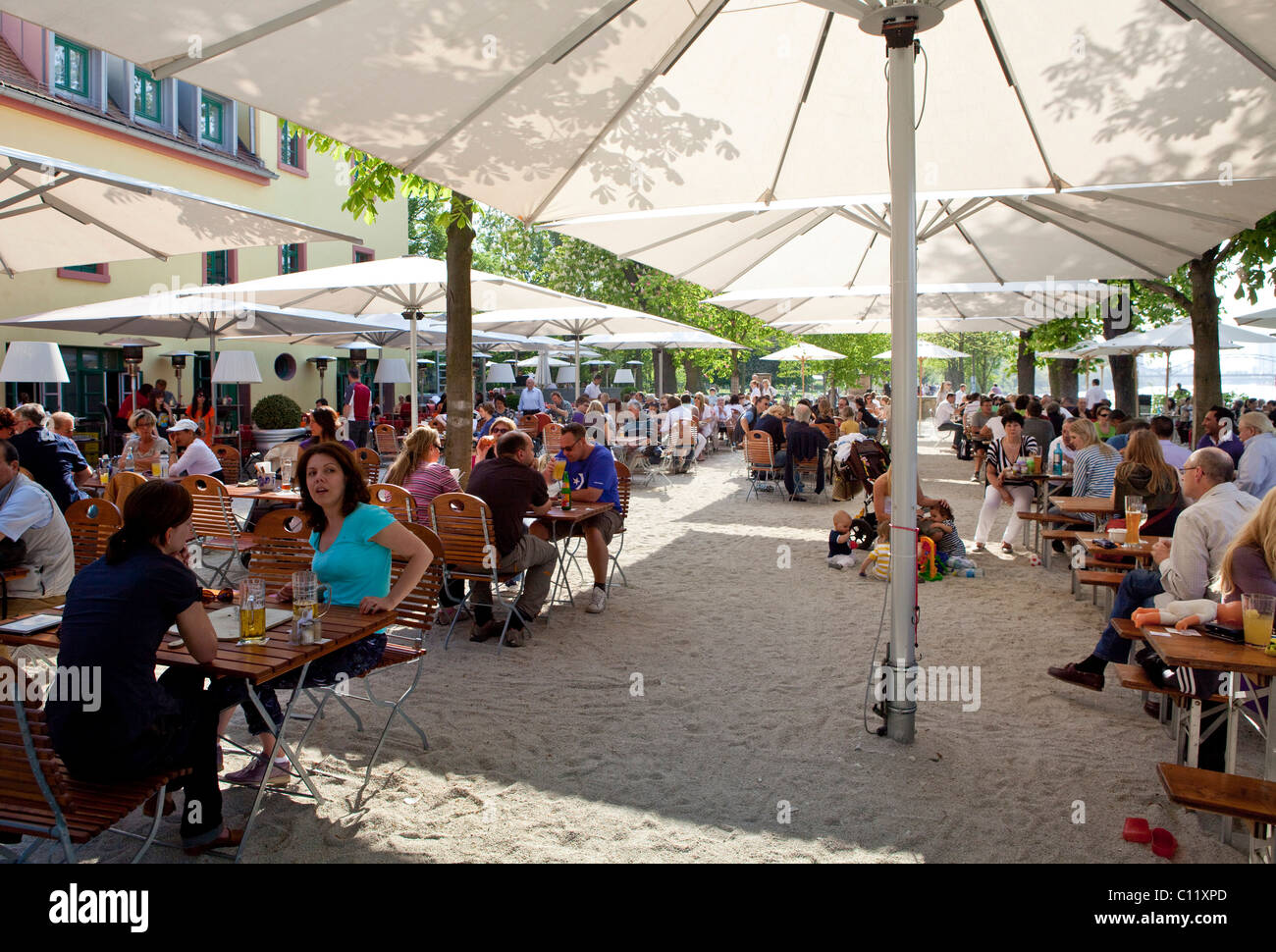 Outdoor restaurant on Main river, cider, Gerbermuehle, Frankfurt, Hesse, Germany, Europe Stock Photo