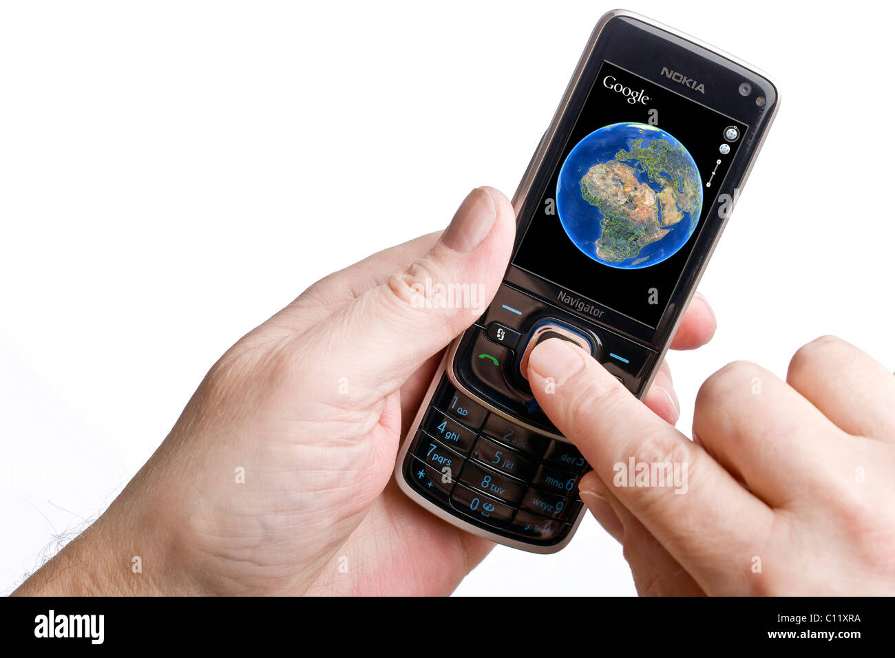 Using Google earth on a mobile phone Stock Photo