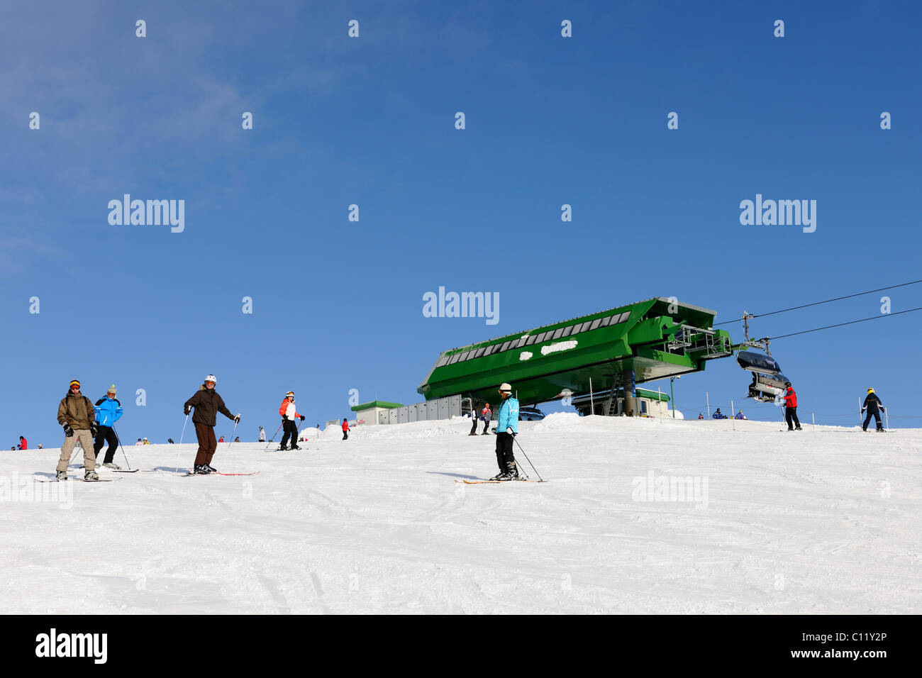 Skilift and skiers on Mt Feldberg, southern Black Forest, Baden-Wuerttemberg, Germany, Europe Stock Photo