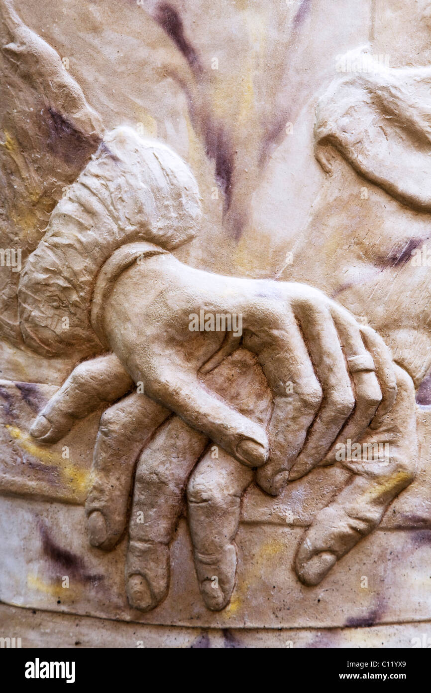 Hands of stone Stock Photo