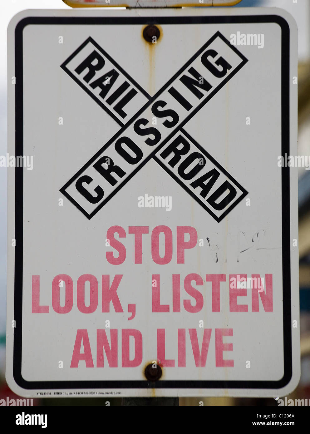 'Stop, look, listen and live', funny railroad crossing sign, Skagway, Alaska, USA Stock Photo