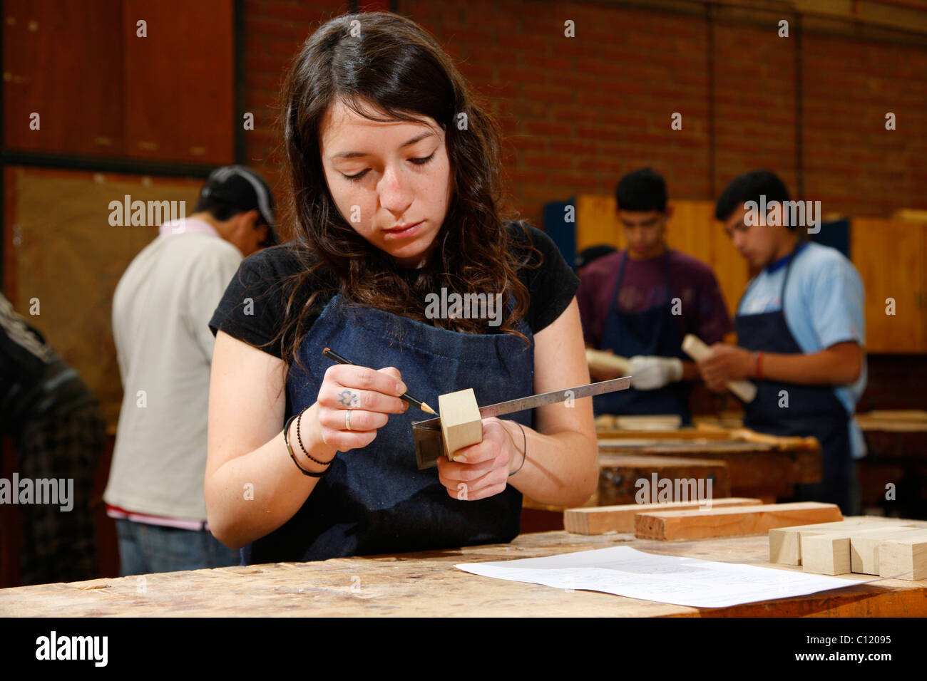 Girl as an apprentice in the carpentry, Fundación Cristo Vive, Santiago de Chile, Chile, South America Stock Photo