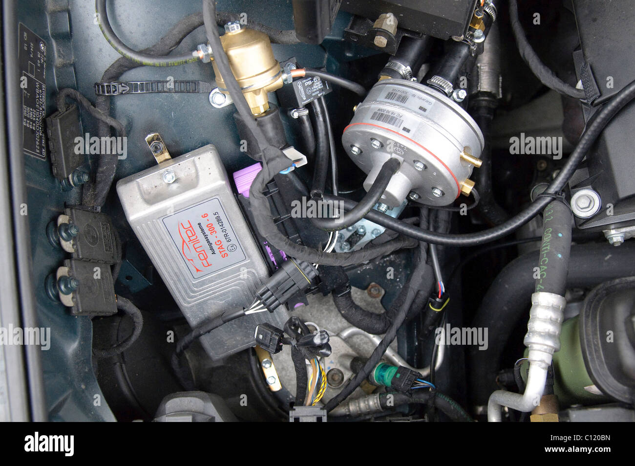 LPG system STAG-300-6 plus in car of the BMW 7 Series, model built 1997, 6-cylinder straight engine with 142kW, Stuttgart Stock Photo - Alamy