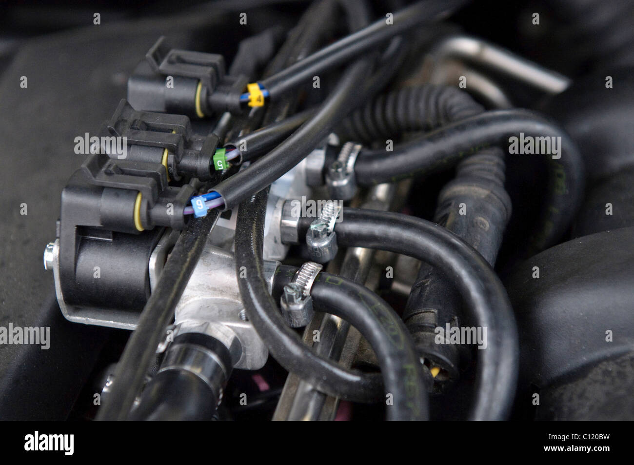 Gas injectors, LPG system STAG-300-6 plus in a car of the BMW 7 Series,  model E38, built 1997, 6-cylinder straight engine with Stock Photo - Alamy