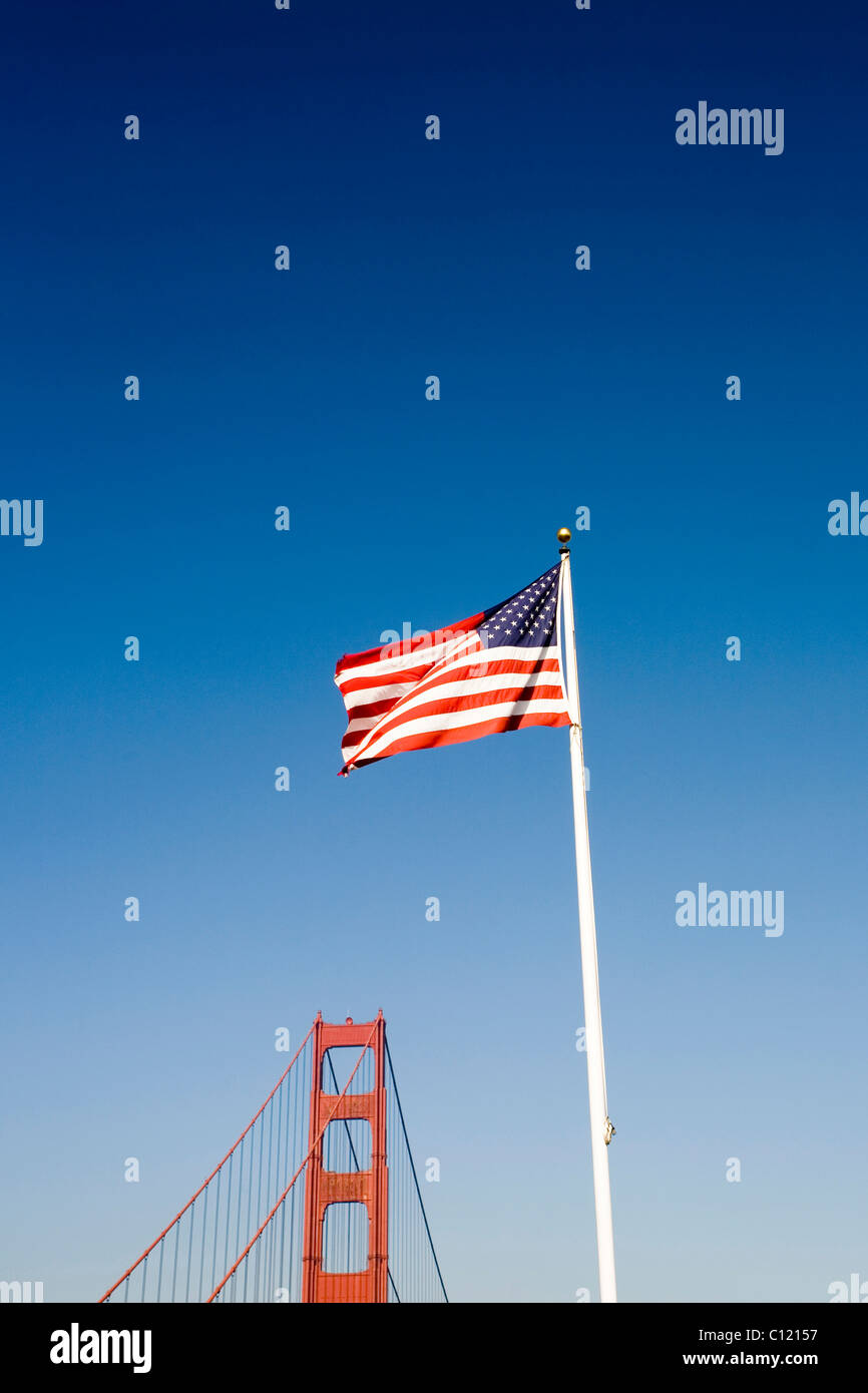 Golden Gate Bridge and American flag, San Francisco, California, United States of America Stock Photo