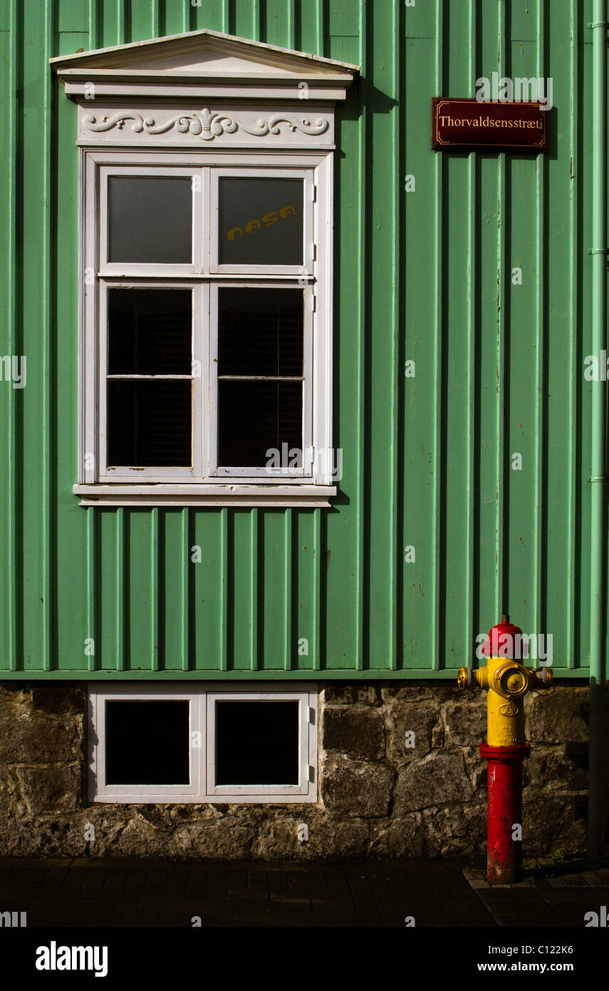 Colourful house and fire hydrant in Thorvaldsensstraeti, Reykjavik, Iceland Stock Photo