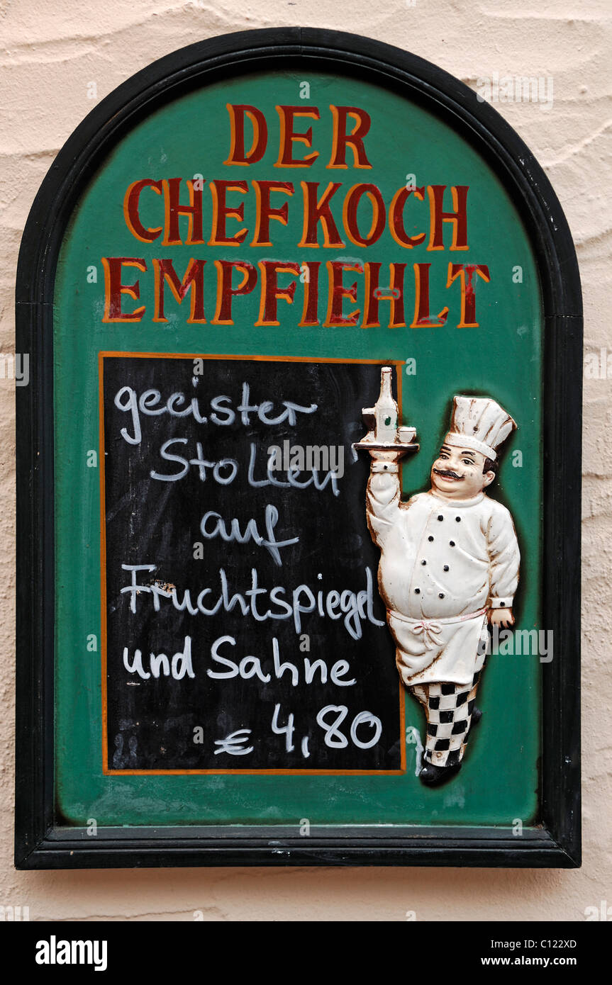 Menu board with cooking figure on a restaurant, Erlangen, Middle ...
