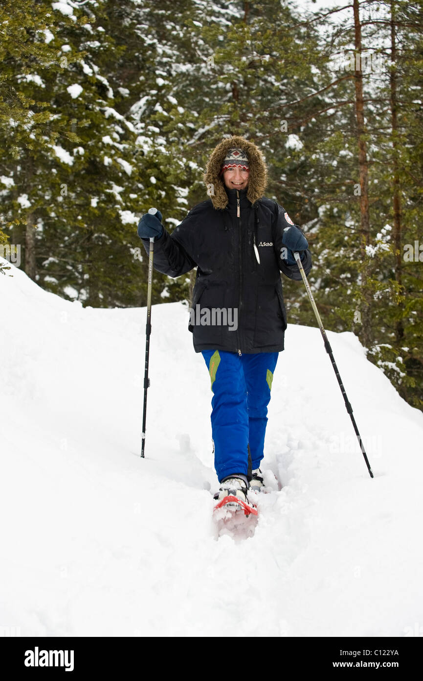 Women walking with snowshoes Stock Photo Alamy