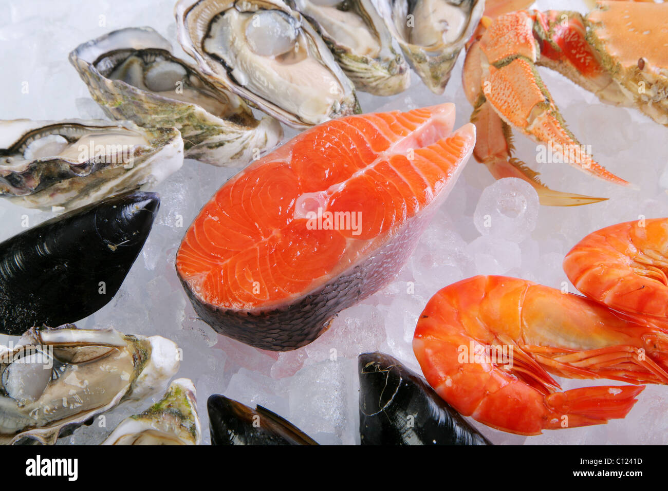 Atlantic salmon cutlet with crab, prawns and mussels Stock Photo