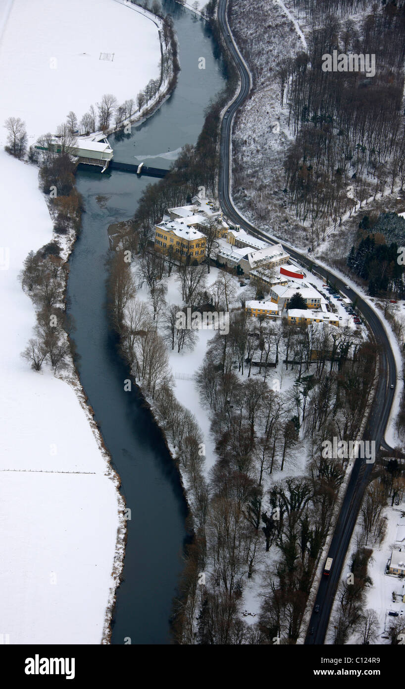 Aerial view, Ruhr river valley in the snow, flood plain, non-profit educational institution of the Protestant Church of North Stock Photo