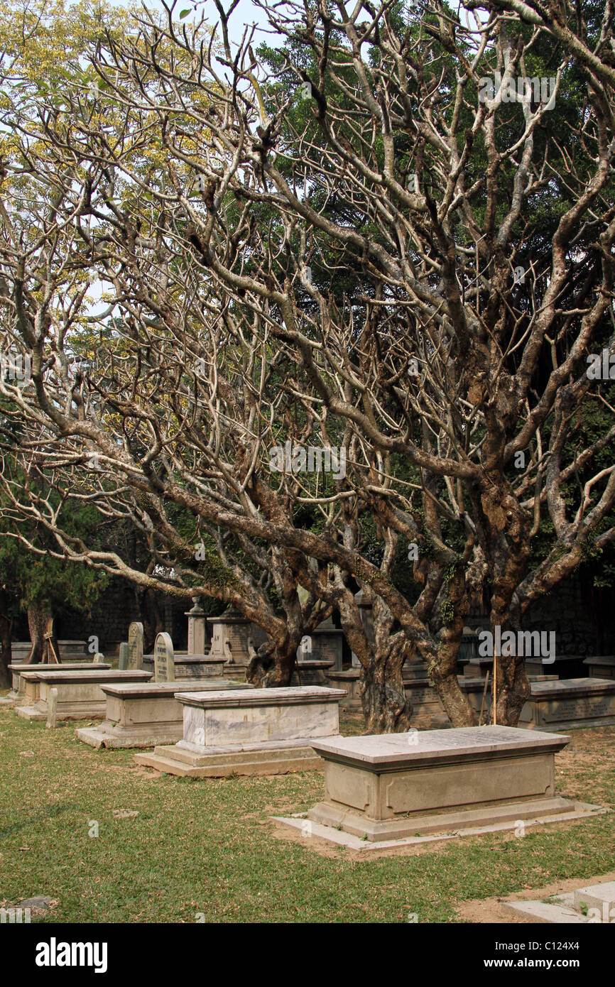 Graves and headstones in the graveyard of the Protestant Cemetery in Macau, China Stock Photo