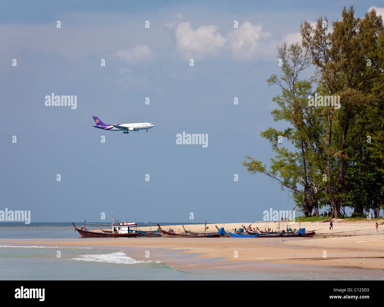Plane of Thai Airways landing on Phuket Island, Southern Thailand, Thailand, Southeast Asia Stock Photo