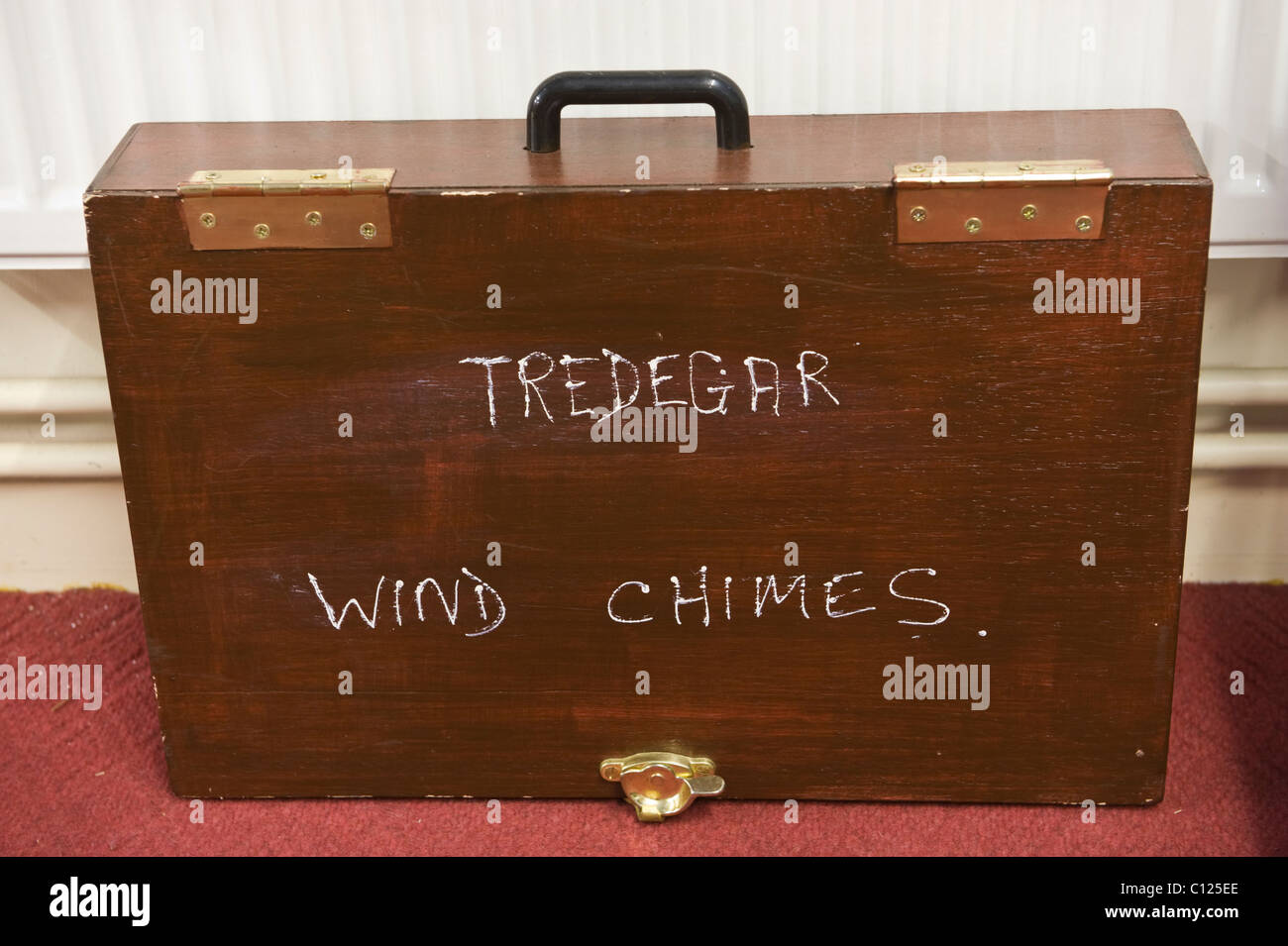 Wooden box for wind chimes in practice room of Tredegar Town Band