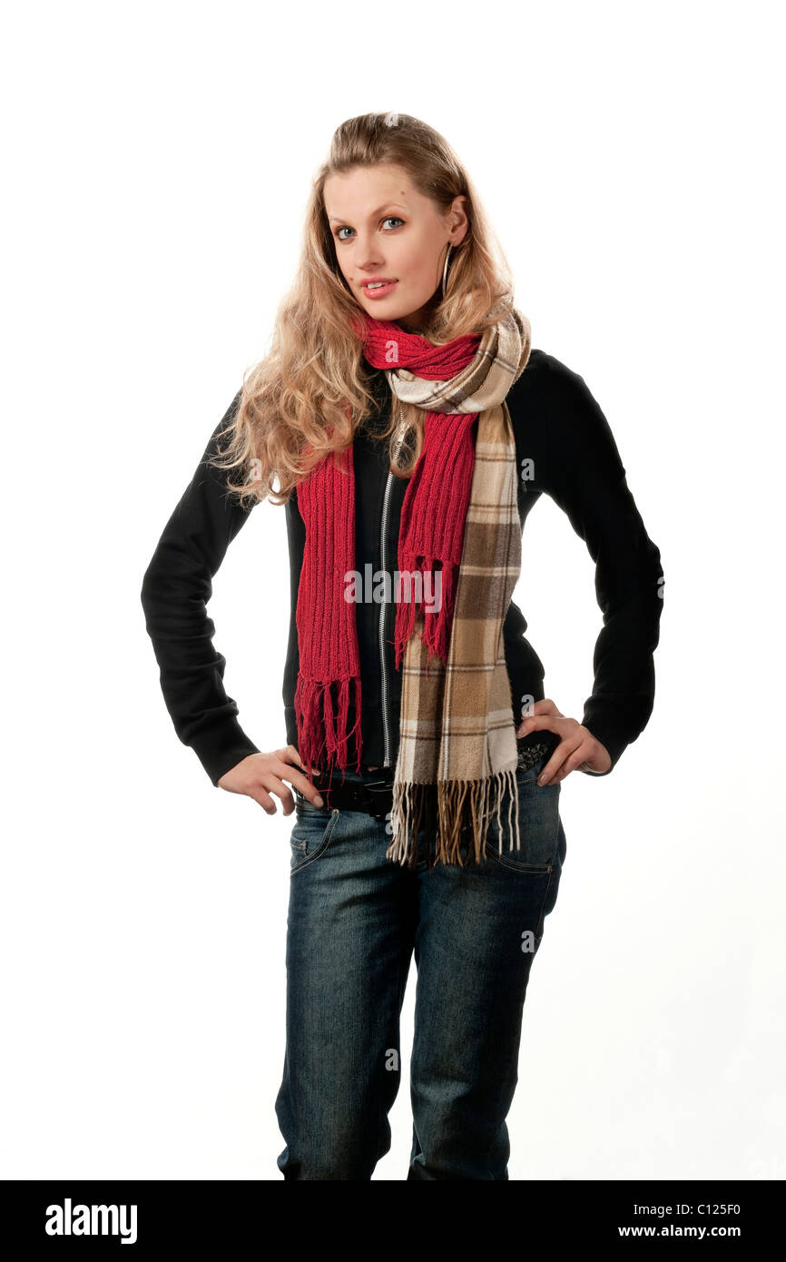 Young woman, 24 years old, with two scarves and wool jumper Stock Photo
