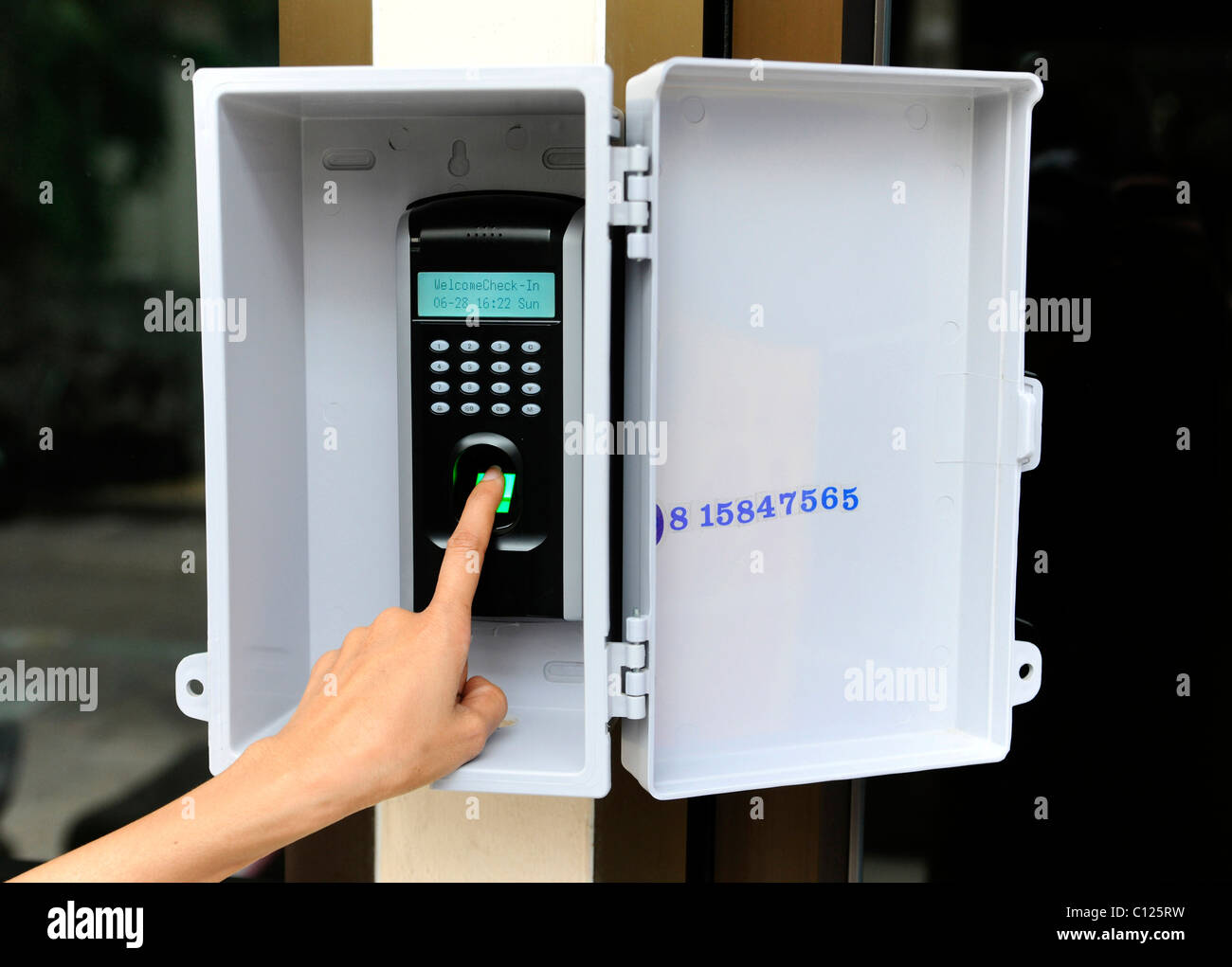 Door opener with finger code Stock Photo Alamy