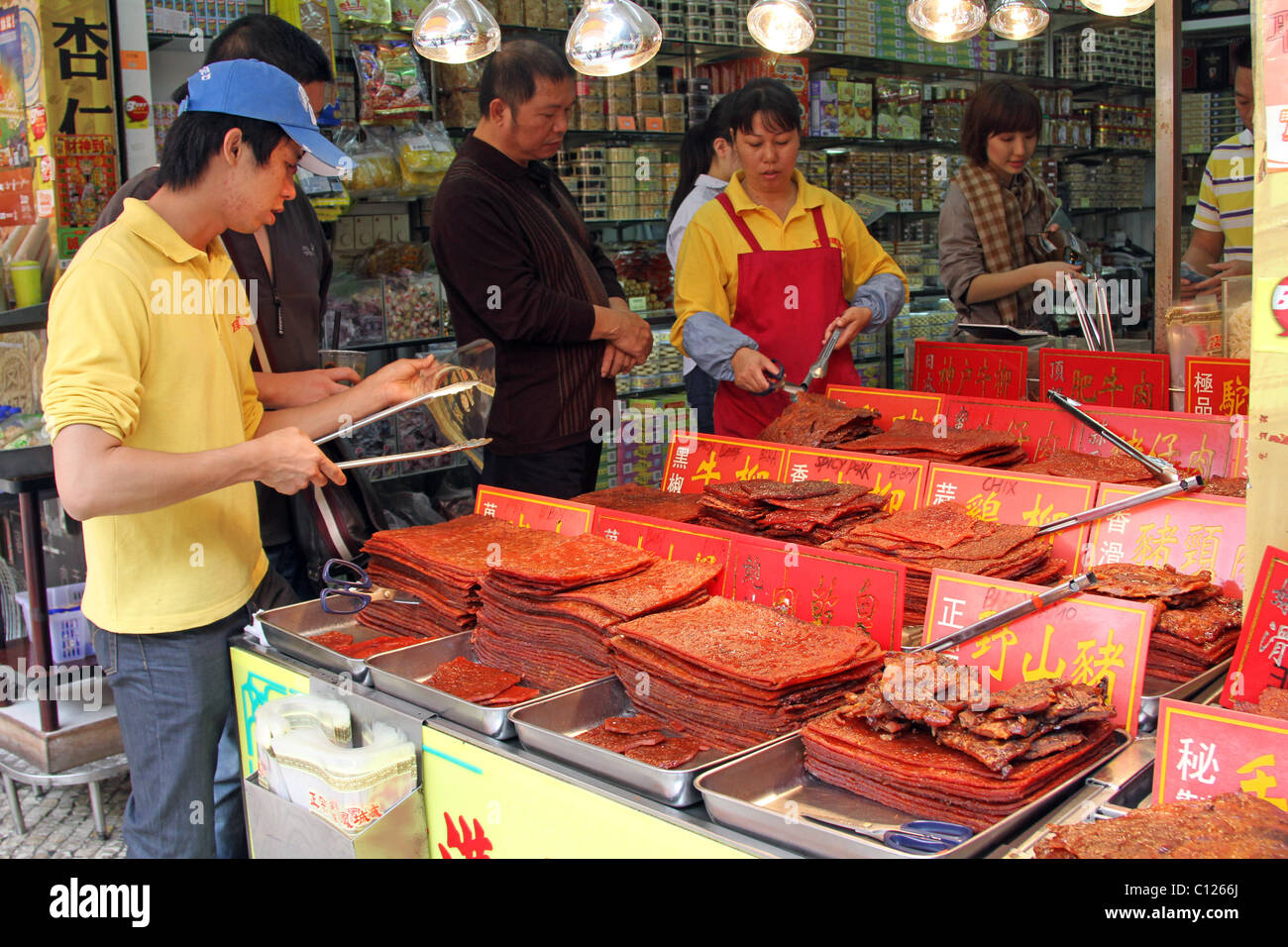 Barbecued meat slab stall in Macau, China.This traditional food is similar to beef jerky slabs. Stock Photo