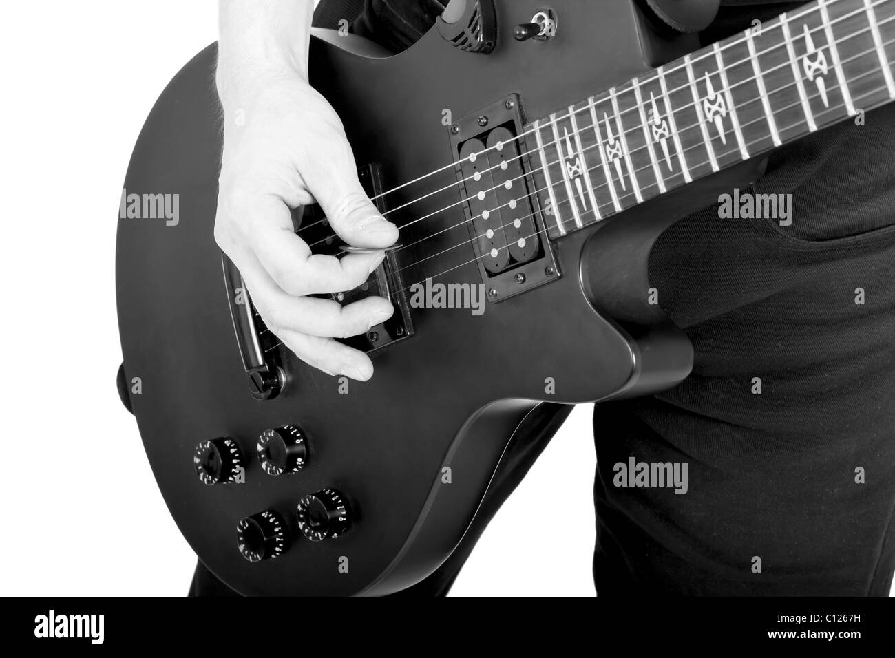 performer with a solo electric guitar on white background. Monochrome