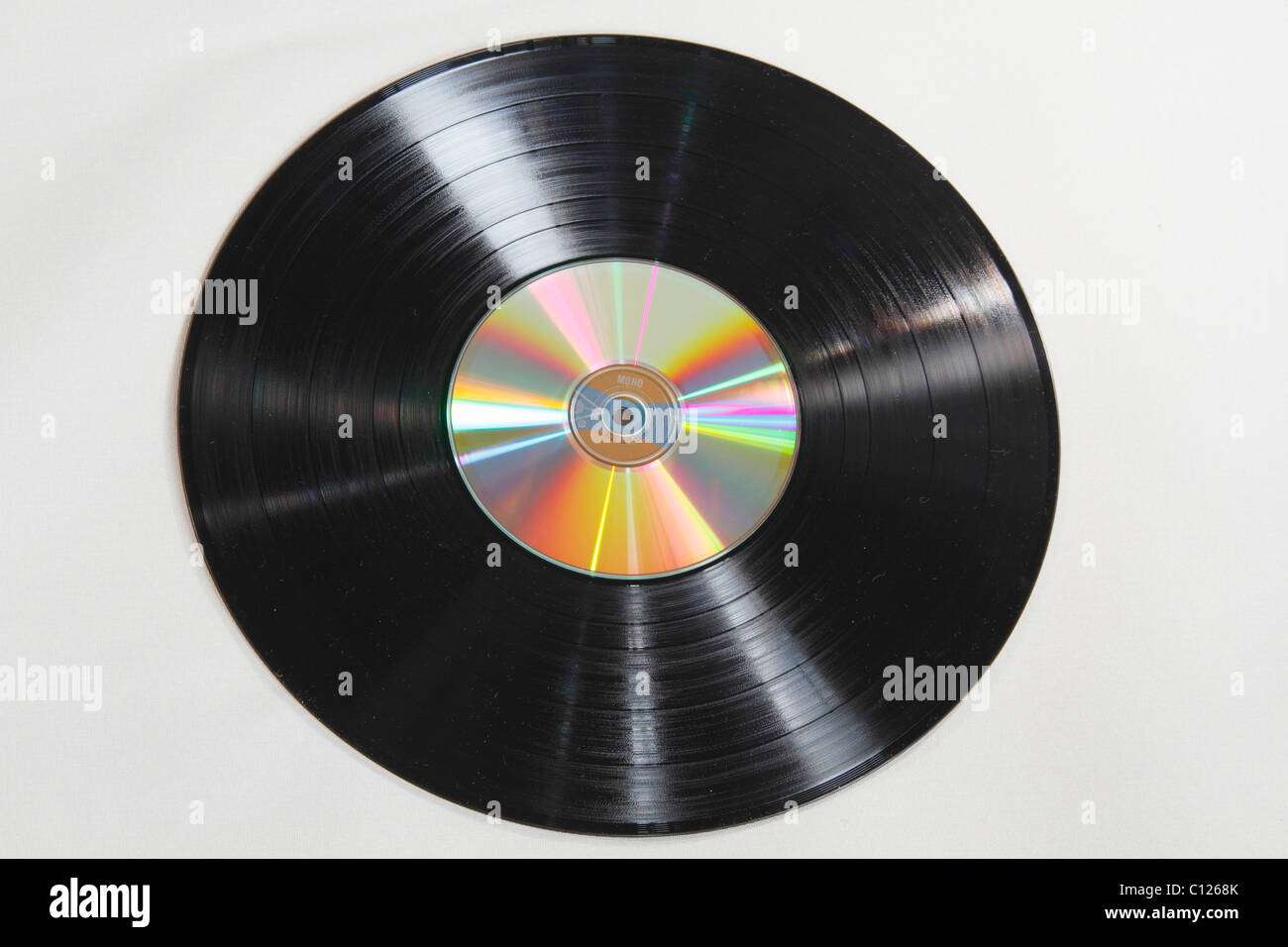CD lying on a record Stock Photo