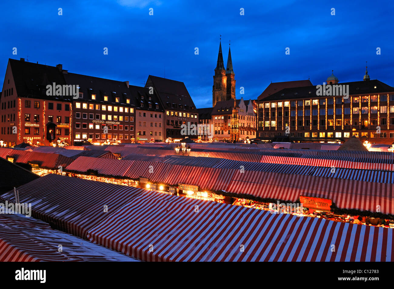 View of the Christkindlesmarkt Christmas market with evening lights, on