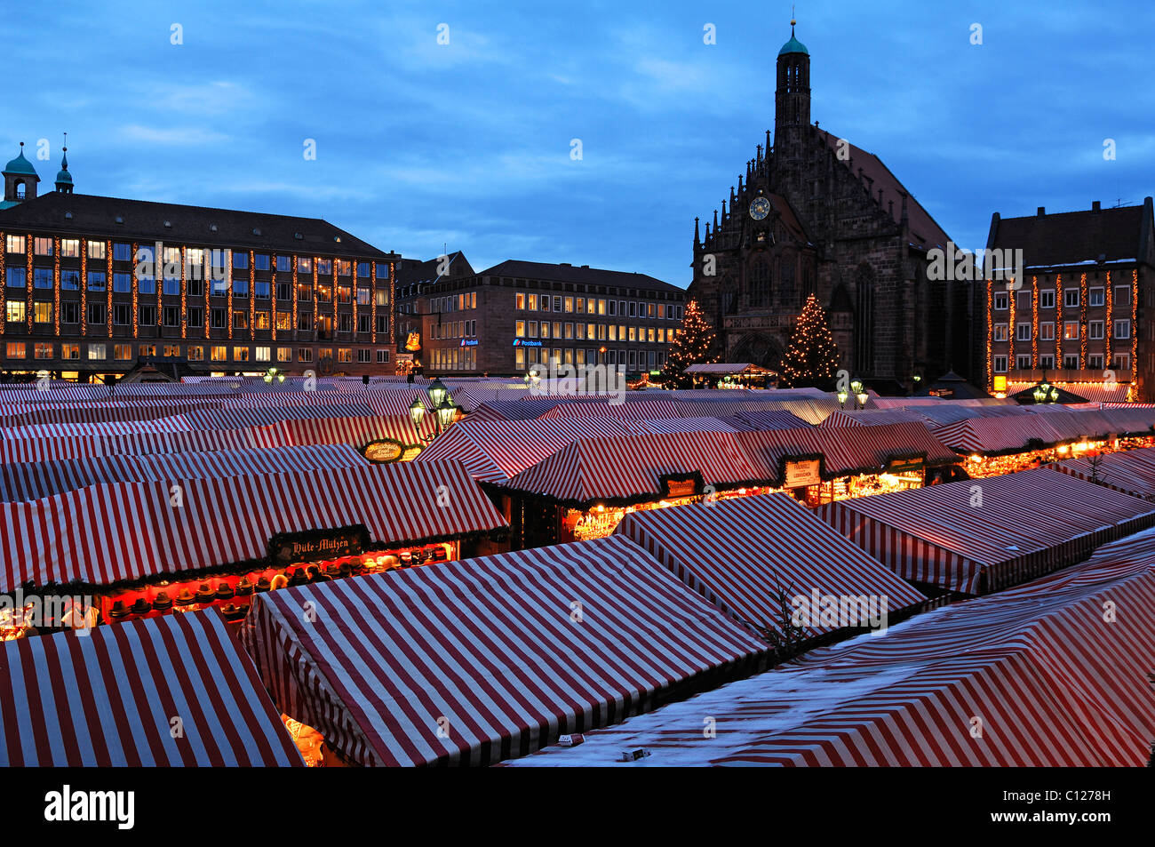 View of the Christkindlesmarkt Christmas market with evening lights, on