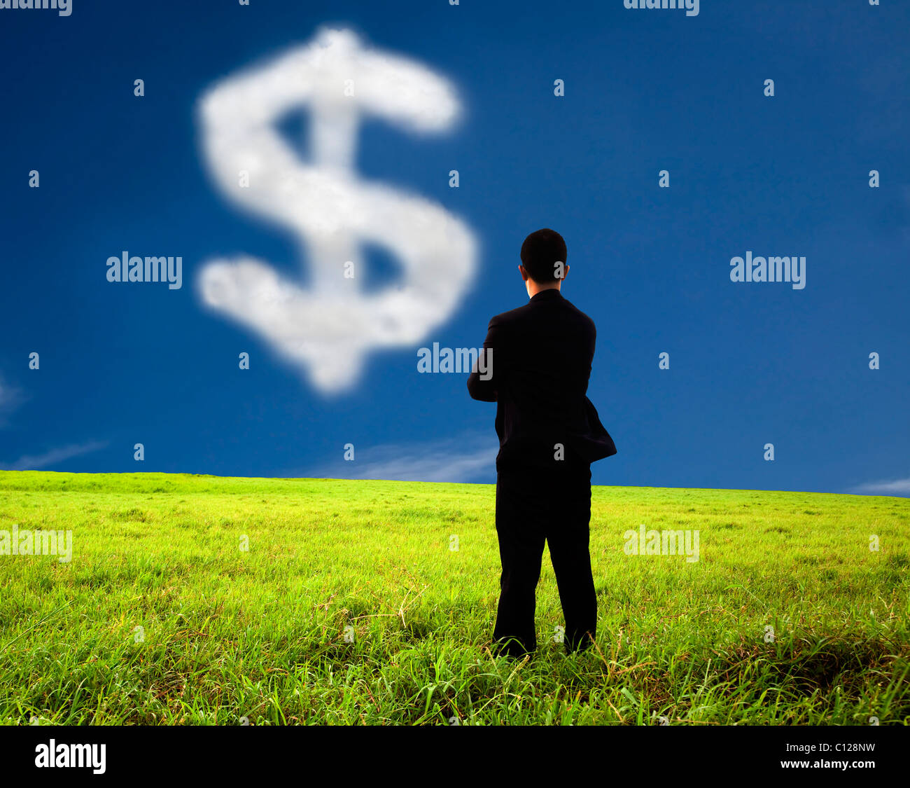 businessman thinking and watching the money mark of cloud Stock Photo