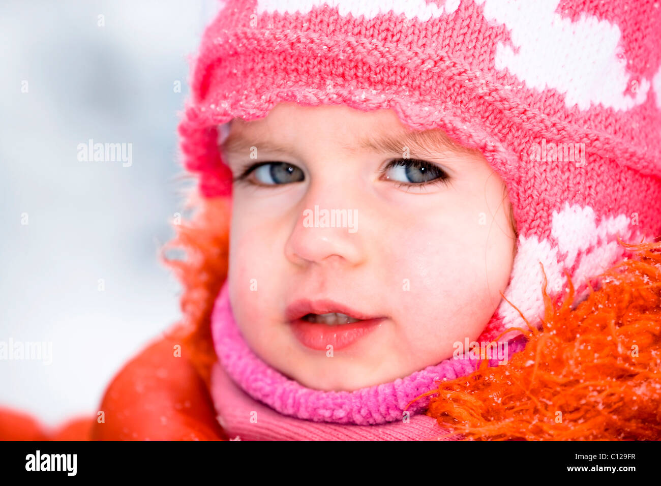 Little girl with a wool cap Stock Photo Alamy