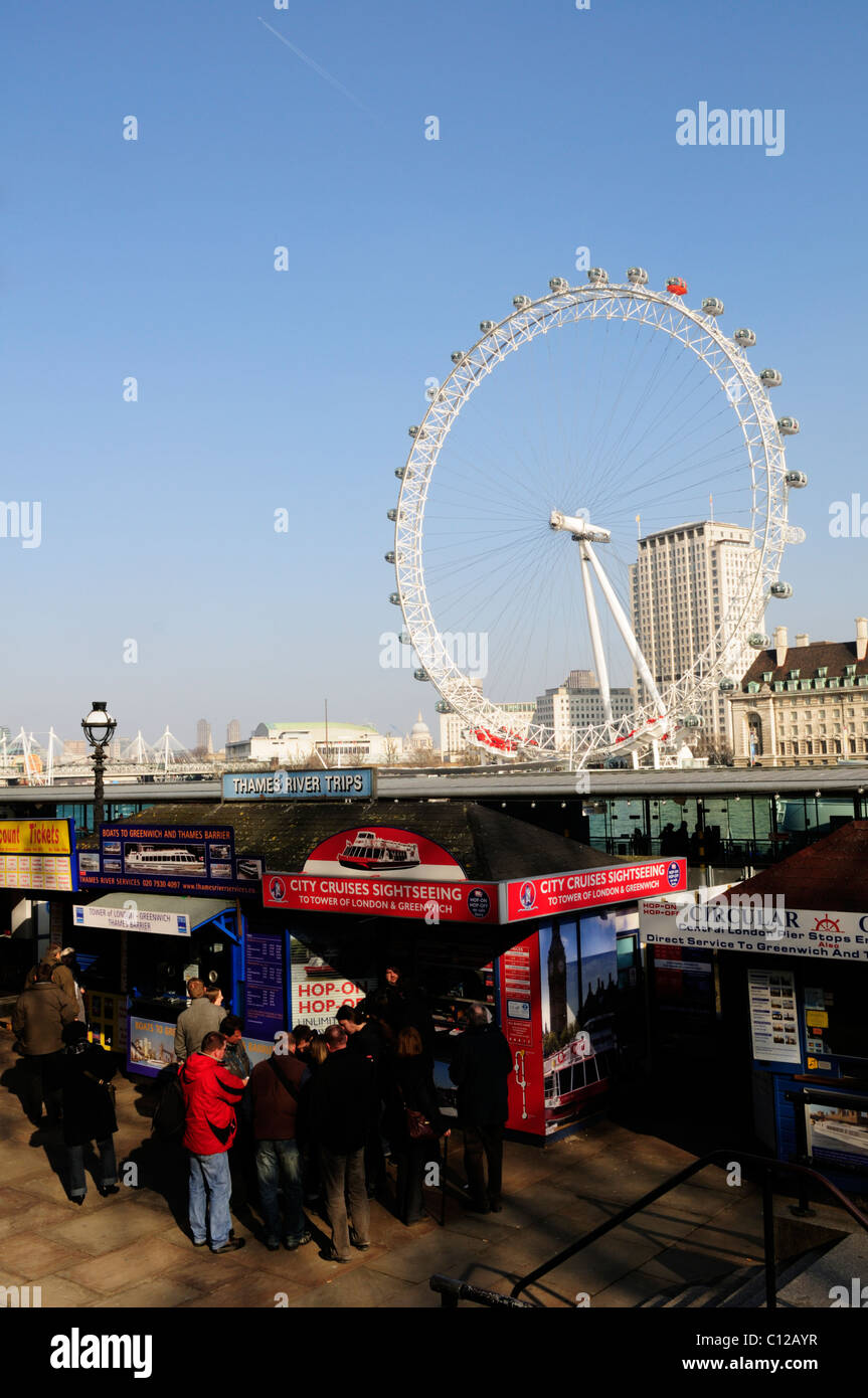 People Queuing for Sightseeing Cruise tickets, Westminster Pier, London, england, UK Stock Photo