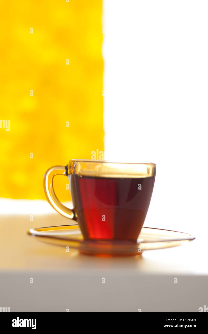 cup of tea next to window, modern minimal look Stock Photo