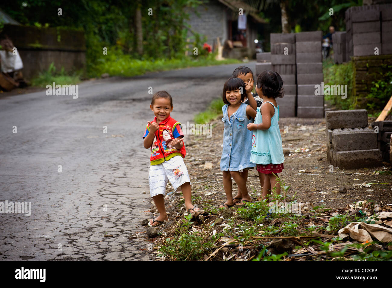 Smiling and happy Balinese children from a village in east Bali called Sideman. Stock Photo