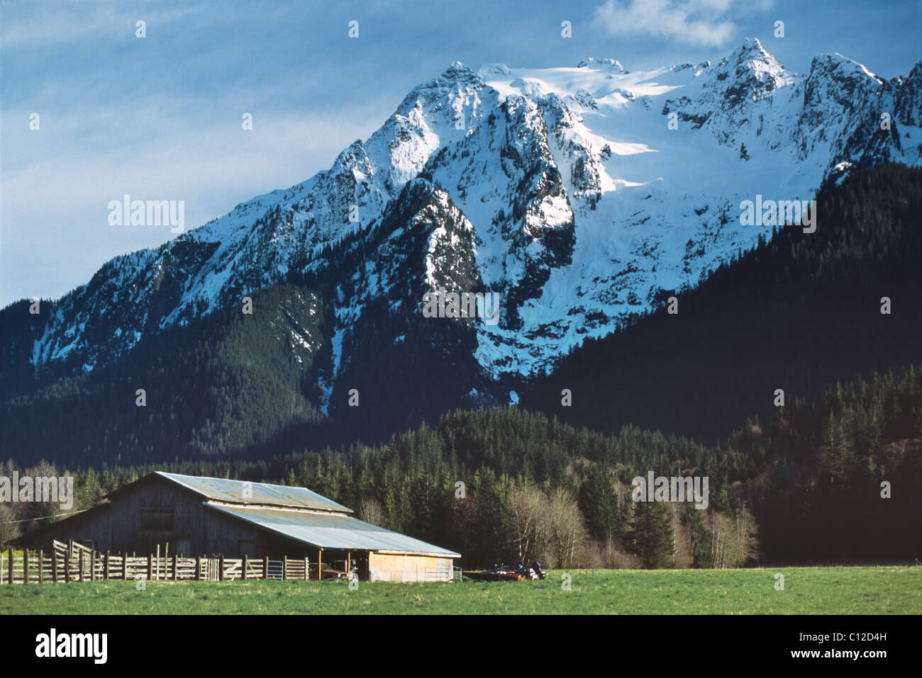 A barn stands in the shadow of Whitehorse Mountain in
