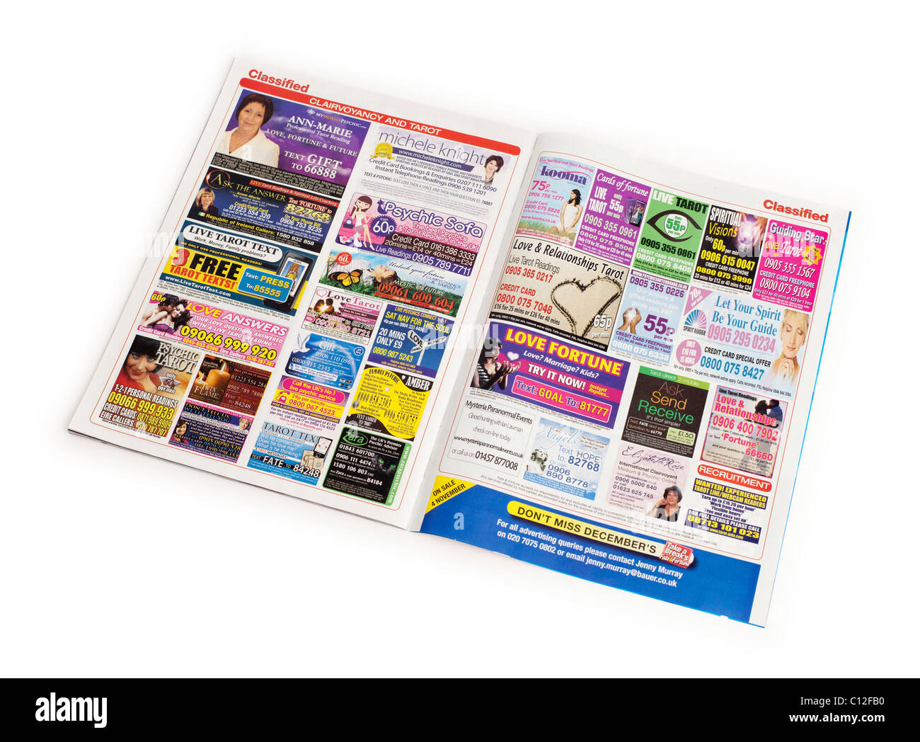 adverts for psychics, clairvoyants, paranormal, tarot and fortune tellers in a weekly womens magazine in the UK Stock Photo