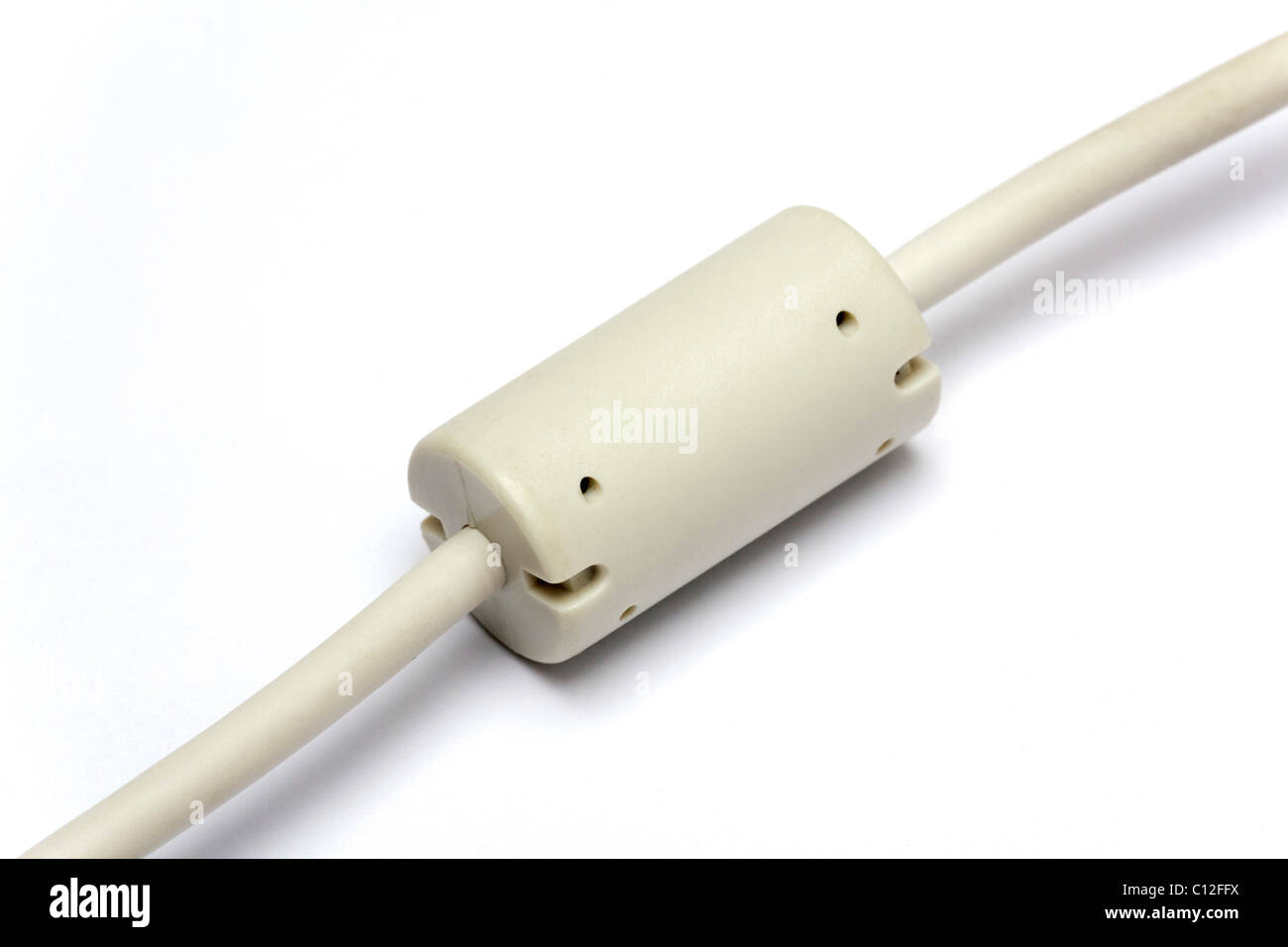 ferrite core interference filter on a cable Stock Photo
