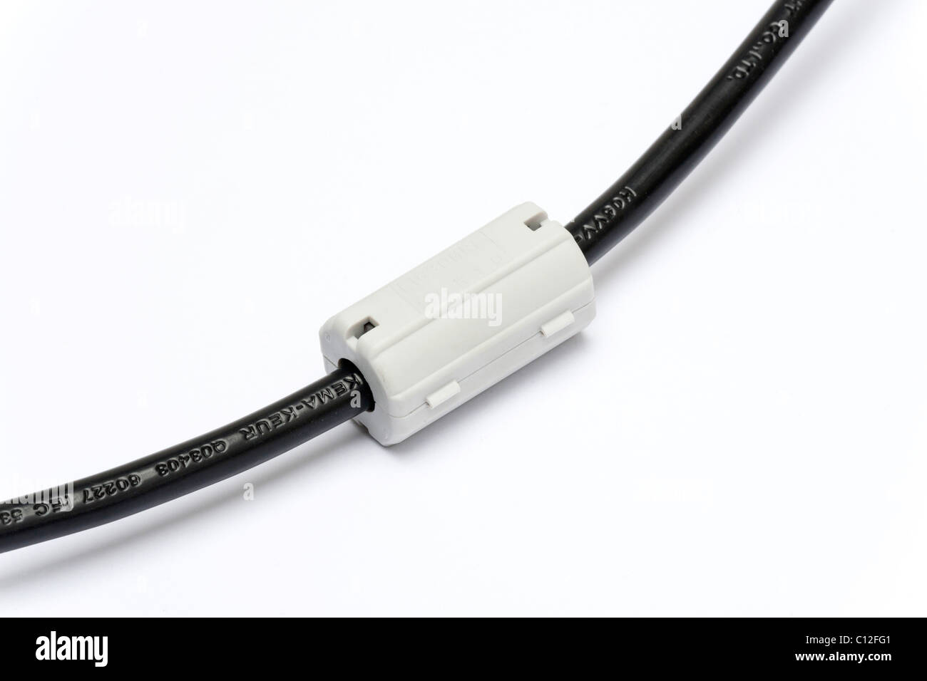 ferrite core interference filter on a cable Stock Photo