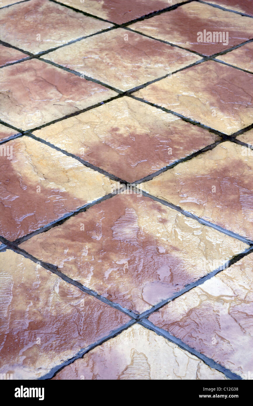 Patio slabs in the rain Stock Photo Alamy