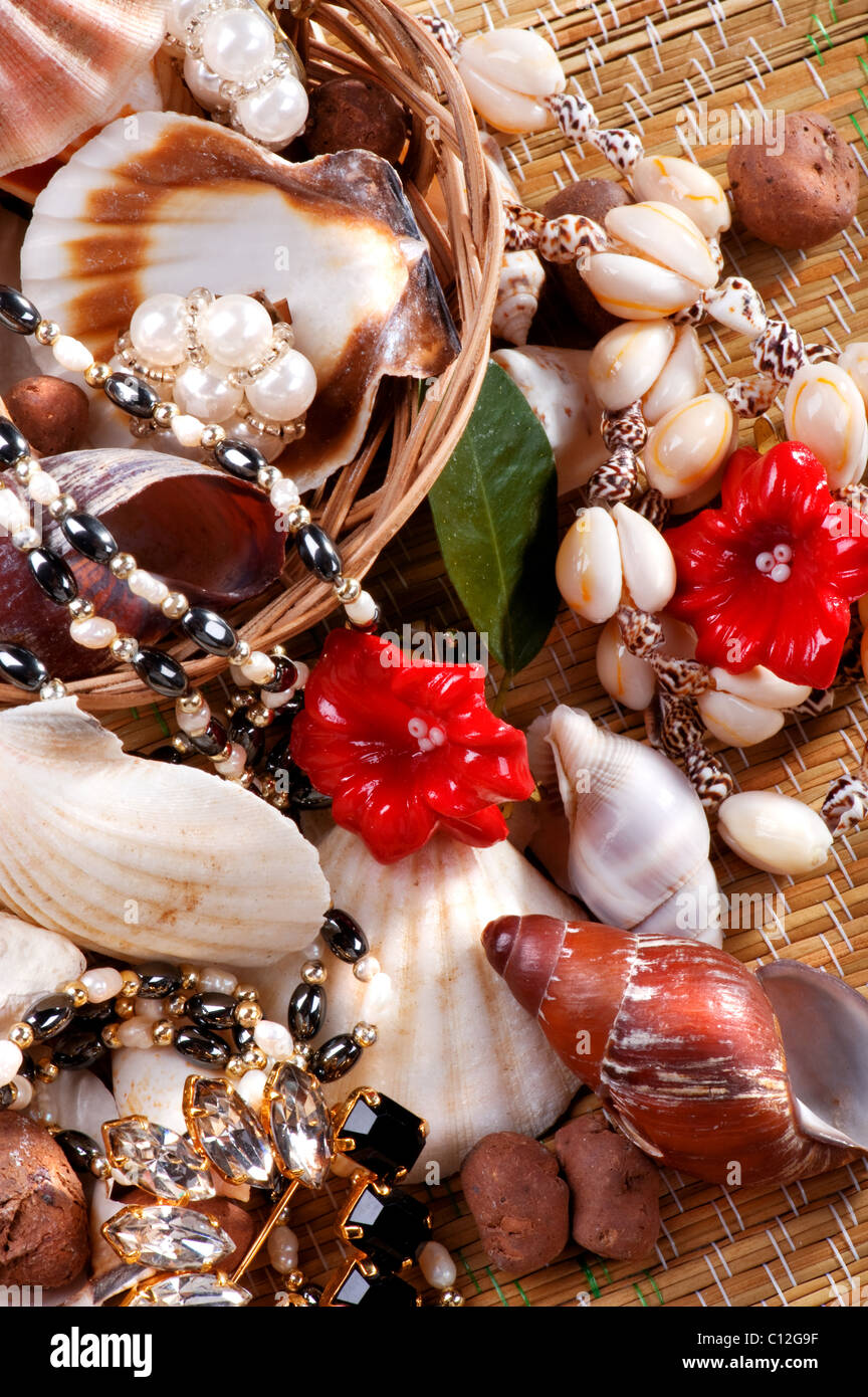 elegance Jewelry with seashells on straw mat Stock Photo