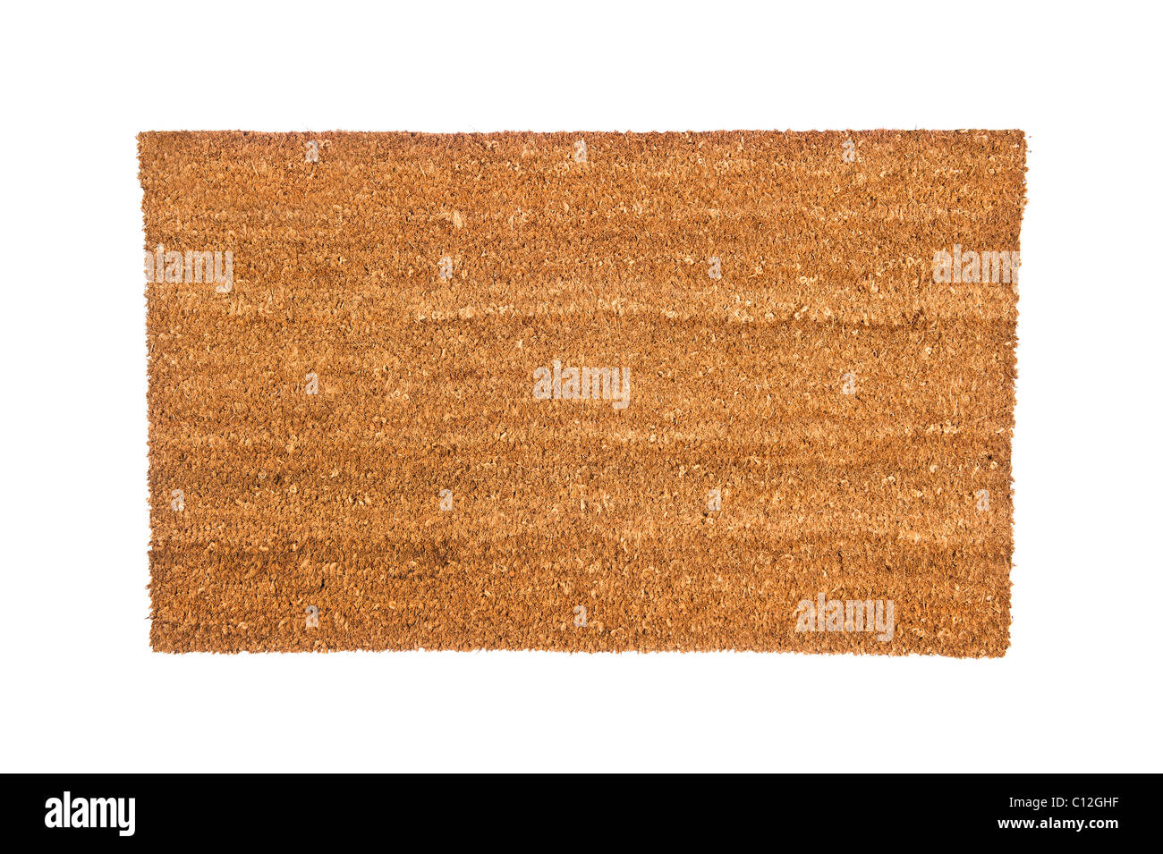 A plain brown doormat isolated on white. Designed can use to place any copy on top of the mat. Stock Photo