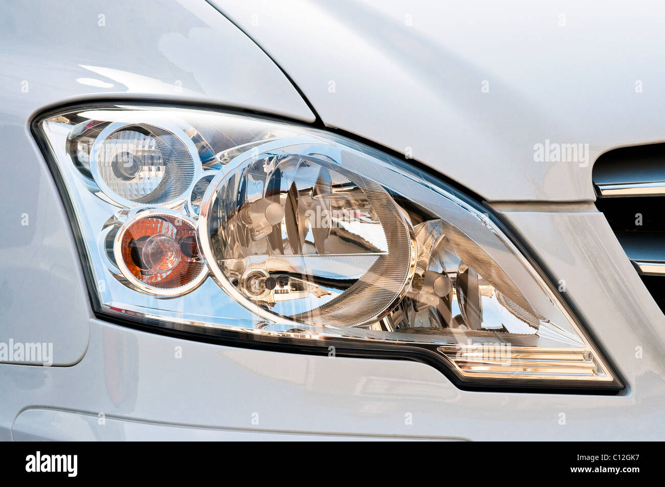 Modern headlamp cluster, Mercedes van - France. Stock Photo