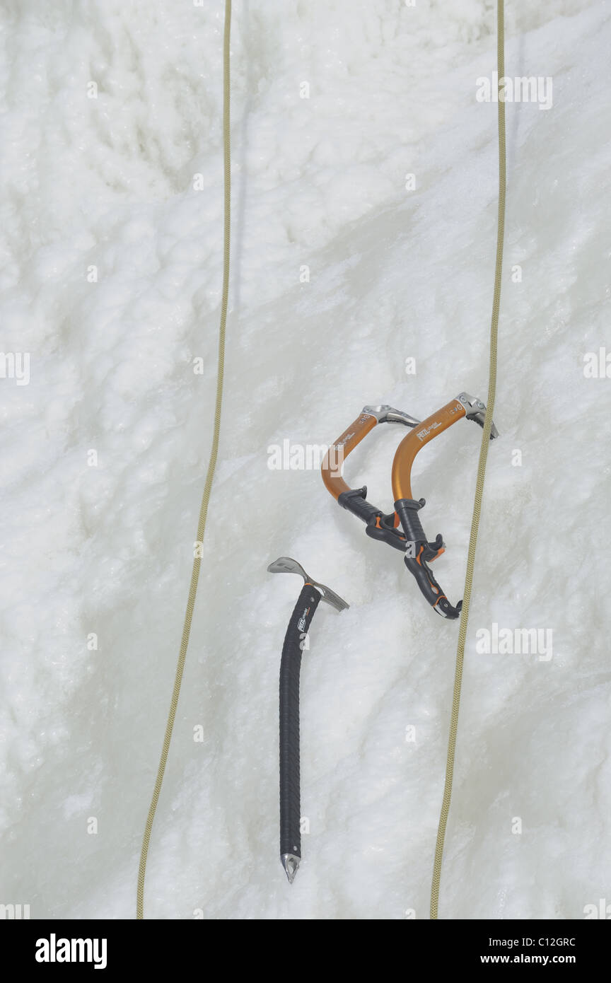 The ice climbing tools, ice axes and ropes on the Devil's Rock at Pikkukoski. Devil's Rock has an artificial glacier for climber Stock Photo