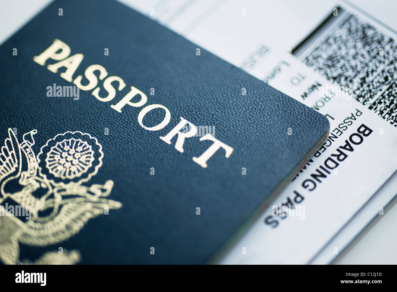 American passport with boarding pass inside Stock Photo