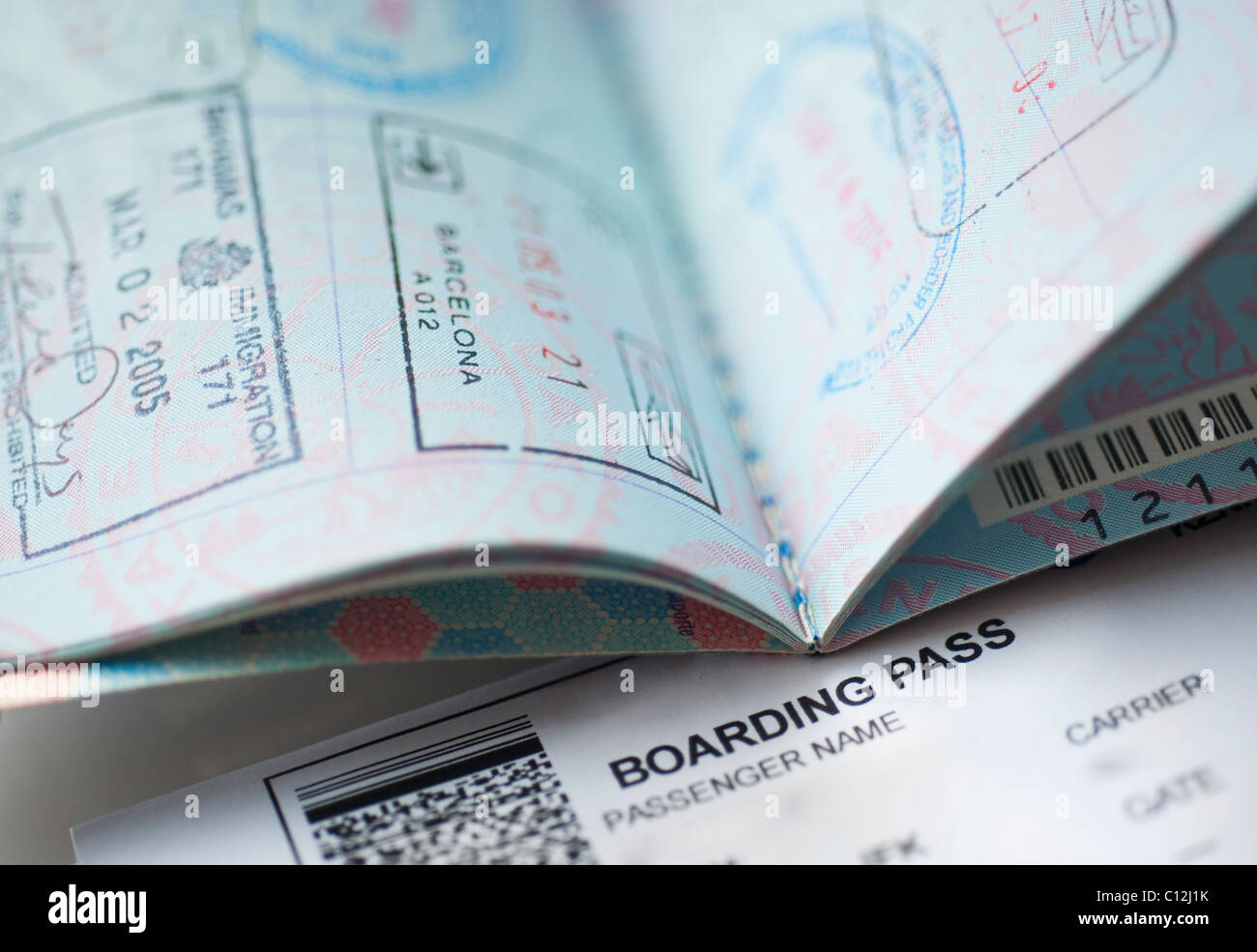 Passport with boarding pass inside Stock Photo
