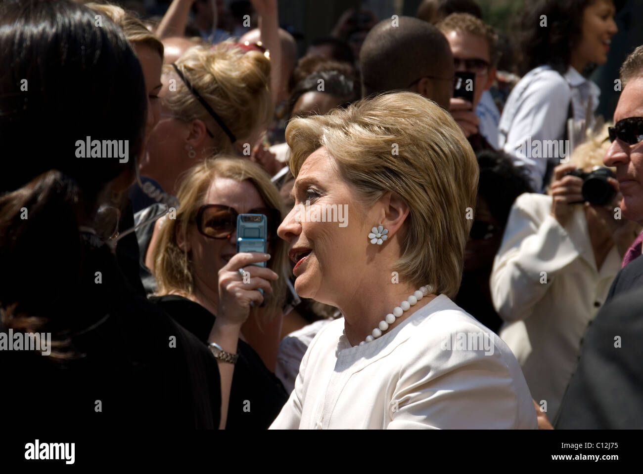 United States Secretary of State Hillary Clinton speaking to admirers Stock Photo